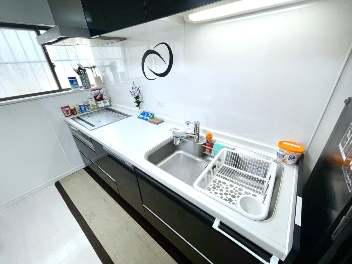 Guesthouse中道 Osaka Esterno foto