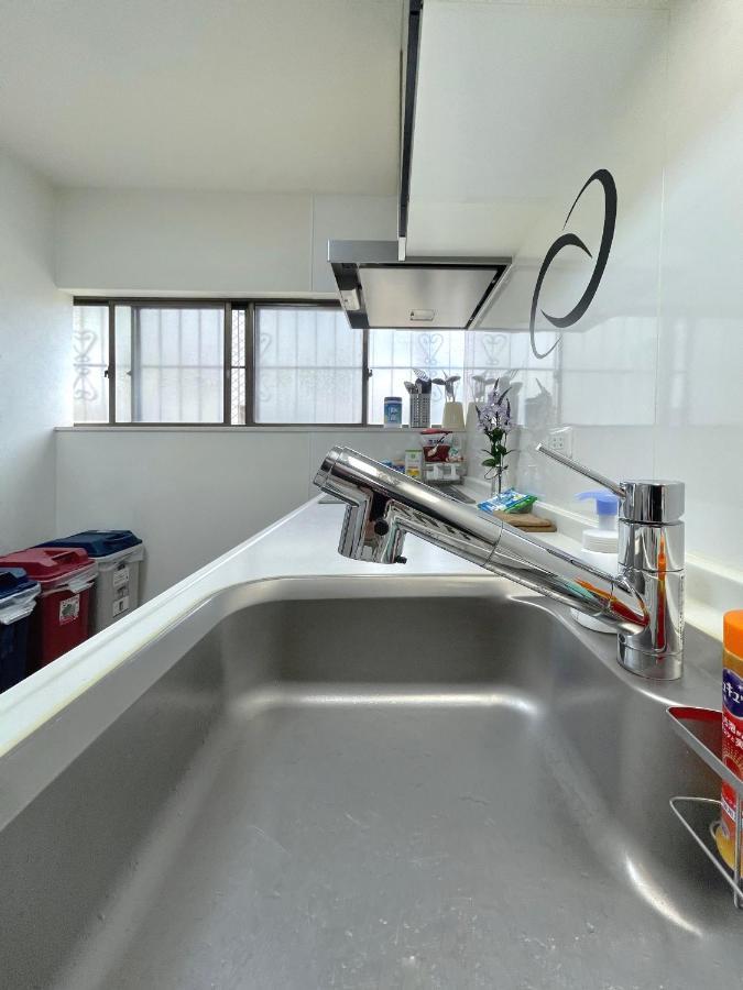 Guesthouse中道 Osaka Esterno foto