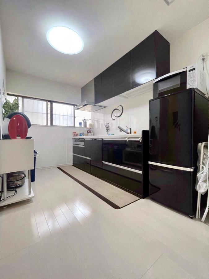 Guesthouse中道 Osaka Esterno foto