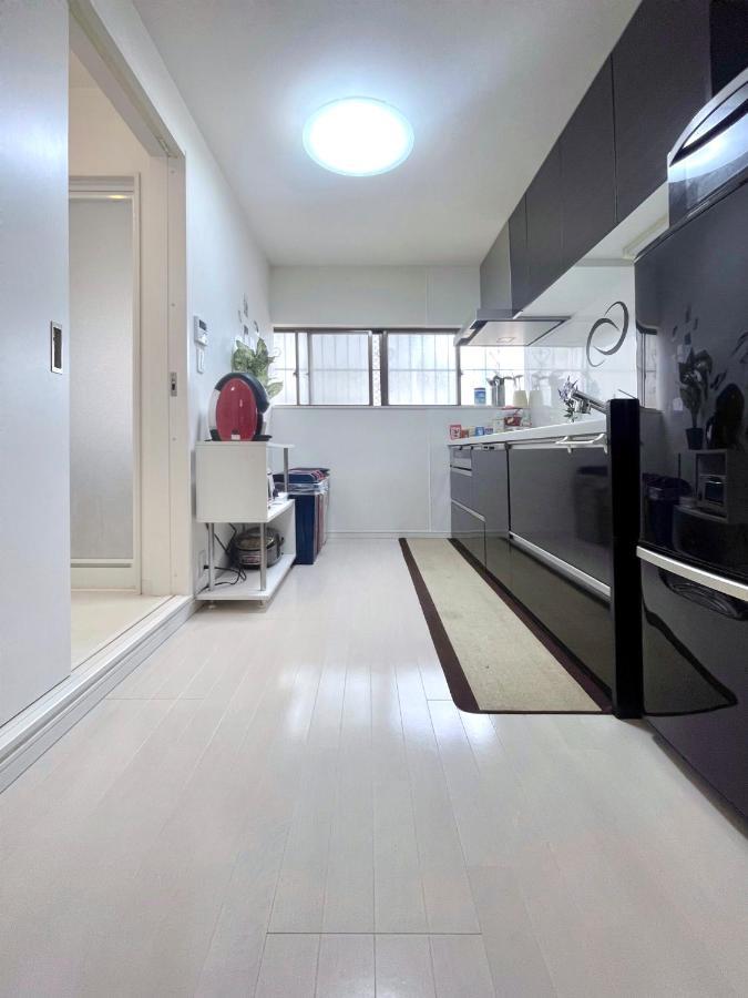 Guesthouse中道 Osaka Esterno foto
