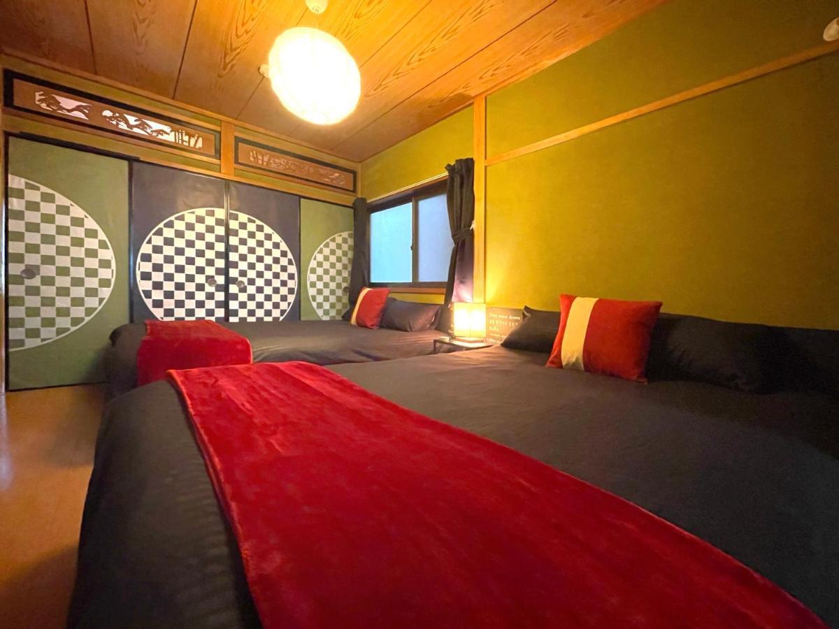 Guesthouse中道 Osaka Esterno foto